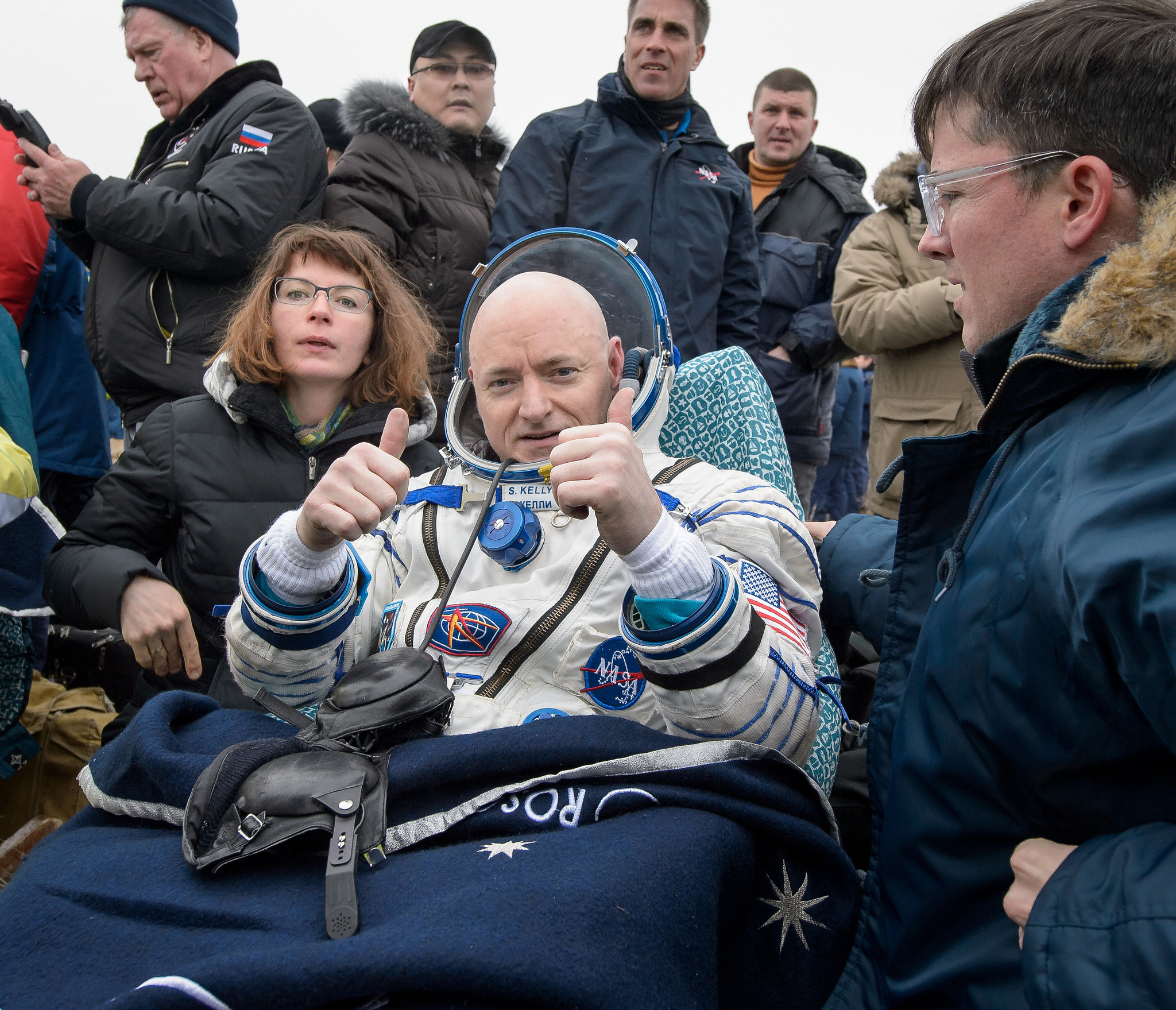 NASA astronaut Scott Kelly gives two thumbs up while resting up from a 340-day mission to the International Space Station. Kelly and two Russian crewmates landed their Soyuz capsule in a remote area of Kazakhstan on March 2, 2016 (Kazakh time).